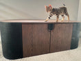 Load image into Gallery viewer, (Dark) Sleek black large litter box enclosure with a playful Bengal kitten on top, showcasing the unit's spacious design and elegant wood finish
